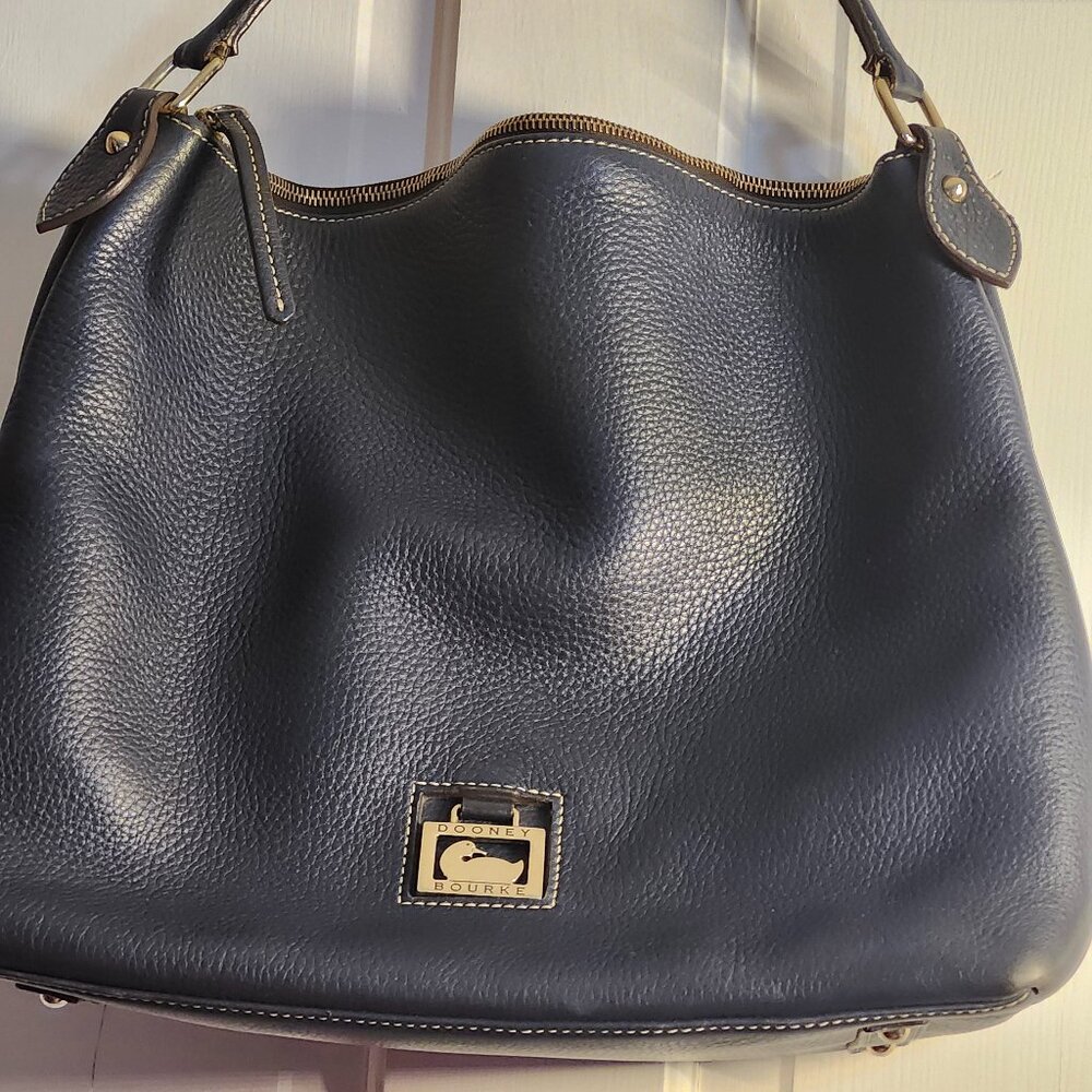 Dooney Bourke Pebbled leather East West Sac in  Marine Blue